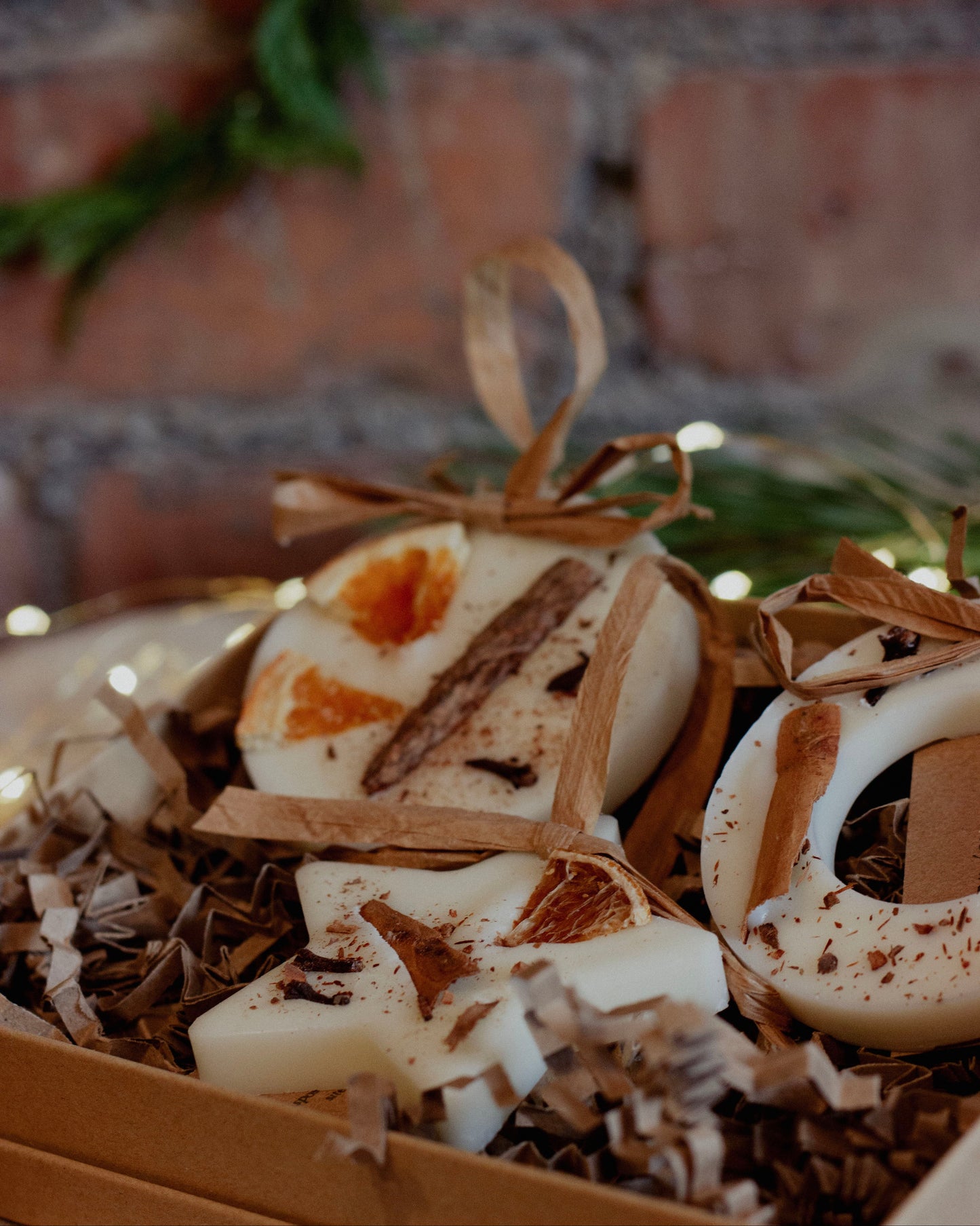 Decorative items including cinnamon sticks and star anise on a rustic background
